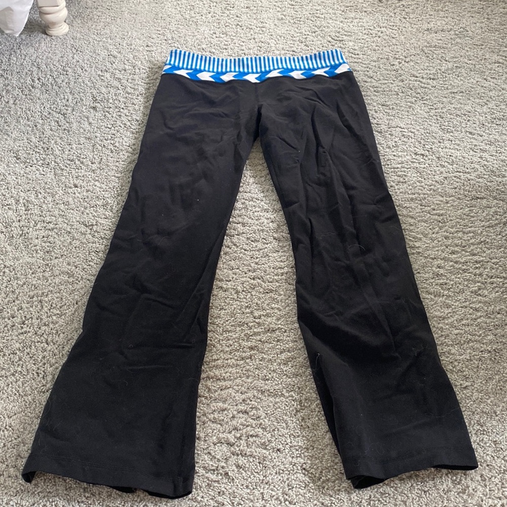 Long lululemon pants. These are the flair pants with a blue waist band.